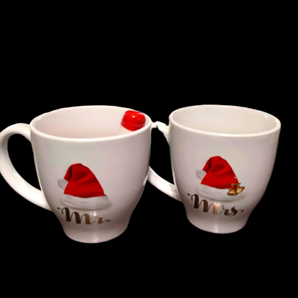 Two oversized Mr. and Mrs. Christmas mug